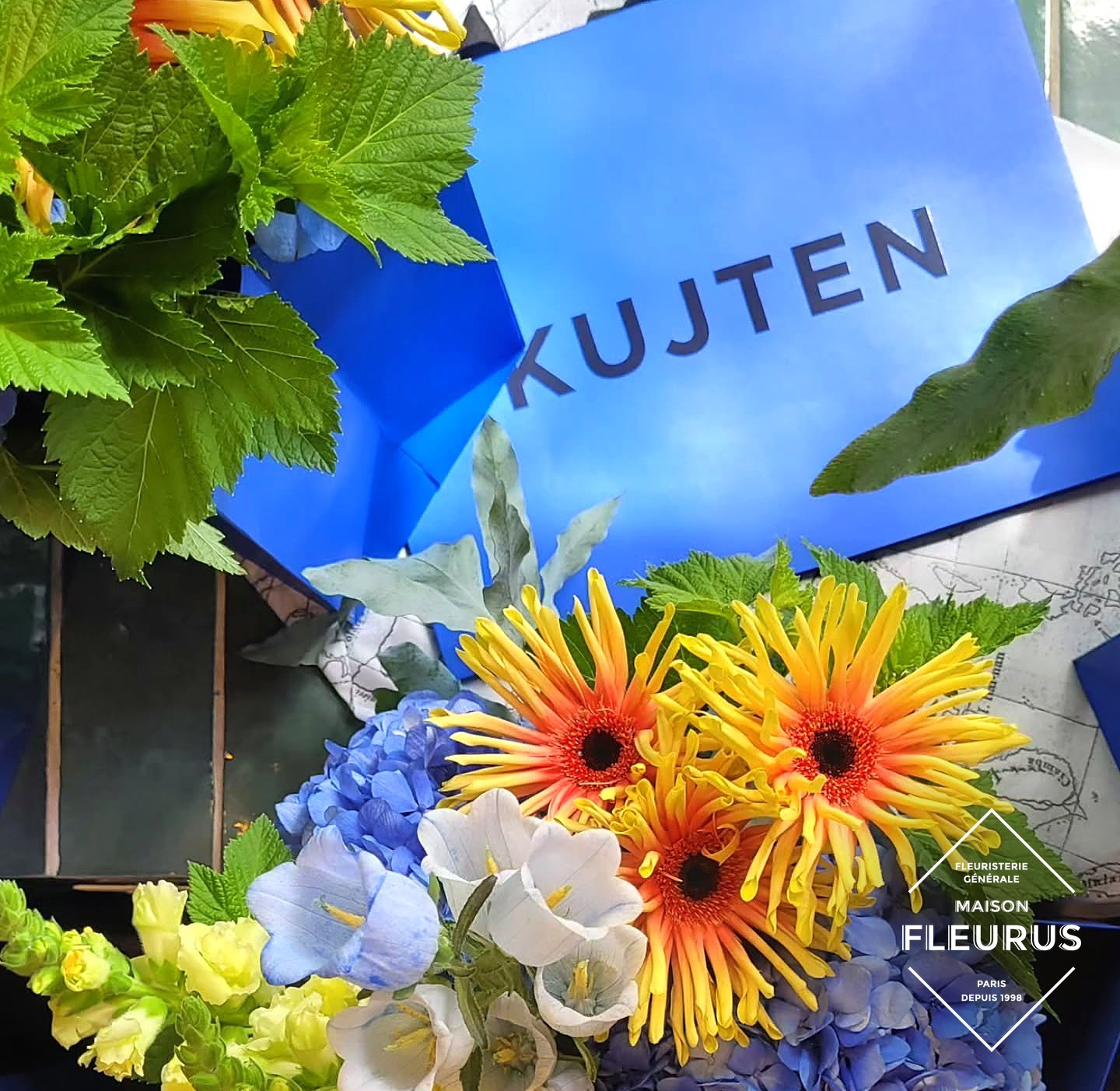Collaboration Kujten x Maison Fleurus — vitrine florale, Fête des Mères